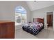 Bedroom with a large window and en-suite bathroom, featuring a vaulted ceiling at 3341 Cranmore Chase, Marietta, GA 30066