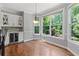 Cozy breakfast nook with built-in wine cooler, large windows, and hardwood floors at 3341 Cranmore Chase, Marietta, GA 30066