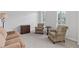 Cozy living room featuring comfortable seating, neutral decor, and bright windows with shutters at 3341 Cranmore Chase, Marietta, GA 30066