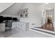 Bright home office with built-in desk, cabinets, shelving, and carpeted floors at 3341 Cranmore Chase, Marietta, GA 30066