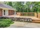 Spacious back deck perfect for entertaining with lovely stone accents and privacy fence at 3845 Parian Nw Rdg, Atlanta, GA 30327