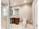 Bathroom featuring a glass shower, granite vanity and white tile at 3845 Parian Nw Rdg, Atlanta, GA 30327