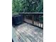 An outdoor deck surrounded by lush green foliage at 107 Highwood Ln, Atlanta, GA 30344
