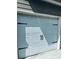 Close up of a one-car garage door on a charming townhome with black door hardware at 107 Highwood Ln, Atlanta, GA 30344