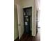 A water heater in a utility closet with an open door and wood-look floors at 107 Highwood Ln, Atlanta, GA 30344