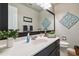 Neutral-toned powder bath with modern fixtures, single sink, and white counter top at 2849 Beddington Way, Suwanee, GA 30024