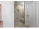 The bathroom features a glass shower at 3265 Bentwood Close, Cumming, GA 30041