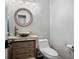 Bathroom featuring vessel sink, modern faucet, and storage at 3265 Bentwood Close, Cumming, GA 30041