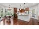 Kitchen featuring a large island, hardwood floors, and lots of natural light at 3265 Bentwood Close, Cumming, GA 30041