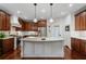 Kitchen featuring a large island, stainless steel appliances, and lots of storage at 3265 Bentwood Close, Cumming, GA 30041