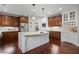 Stylish kitchen features custom cabinets, stainless steel appliances, and a large center island at 3265 Bentwood Close, Cumming, GA 30041