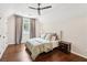 Bedroom with slanted ceilings, hardwood floors, neutral tones and lots of natural light at 3851 Glenhurst Se Dr, Smyrna, GA 30080