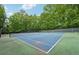 Enjoy a match on the community tennis courts surrounded by lush greenery, perfect for an active lifestyle at 3851 Glenhurst Se Dr, Smyrna, GA 30080
