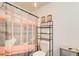 A serene bathroom featuring a unique shower curtain and a sleek shelving unit at 51 Norton Ave, Acworth, GA 30101