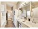 Bright bathroom featuring a tub and double vanity with modern fixtures at 51 Norton Ave, Acworth, GA 30101