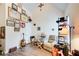 Bright, disorganized room with vaulted ceilings and a recliner at 51 Norton Ave, Acworth, GA 30101