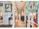 Elegant entryway with hardwood floors, decorative mirrors, and a view into the home at 51 Norton Ave, Acworth, GA 30101