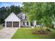 Well-maintained home with a spacious front yard and a classic architectural style at 51 Norton Ave, Acworth, GA 30101