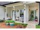 Inviting front porch with rocking chairs, decorative lanterns, and a cheerful blue door at 51 Norton Ave, Acworth, GA 30101