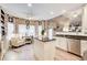 Open concept kitchen features an island, updated appliances, and wood floors at 51 Norton Ave, Acworth, GA 30101