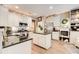 Modern kitchen featuring an island with black countertops and stainless steel appliances at 51 Norton Ave, Acworth, GA 30101