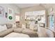 Inviting living room featuring a large sectional sofa and an open layout at 51 Norton Ave, Acworth, GA 30101