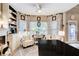 Cozy living area with natural light, wood floors, and decorative curtains at 51 Norton Ave, Acworth, GA 30101