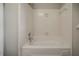 Bathtub shower combination with tile surround at 6351 Stablewood Way, Lithonia, GA 30058