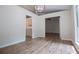 Open floorplan with view from dining area to living room and kitchen at 9691 Squirrel Wood Run, Douglasville, GA 30135