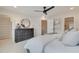 Bright bedroom featuring a dresser, mirror, and doorways to a closet and bathroom at 1932 Appian Aly, Kennesaw, GA 30144