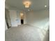 Spacious bedroom with plush carpet, recessed lights and ensuite bathroom at 1932 Appian Aly, Kennesaw, GA 30144