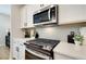 Modern kitchen features stainless steel appliances and stylish countertops at 1932 Appian Aly, Kennesaw, GA 30144
