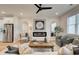 Living room showcasing a fireplace, neutral decor, and hardwood floors at 1932 Appian Aly, Kennesaw, GA 30144