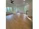 Open living room features hardwood floors, recessed lighting, and ample natural light at 1932 Appian Aly, Kennesaw, GA 30144