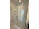 Stylish bathroom with frameless glass shower, white subway tiles, and light flooring at 1932 Appian Aly, Kennesaw, GA 30144