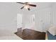 Bedroom featuring wood floors, a ceiling fan, and natural light at 238 Ivy Glen Cir, Avondale Estates, GA 30002