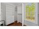 Walk-in closet featuring custom shelving, drawers, and a window at 238 Ivy Glen Cir, Avondale Estates, GA 30002