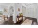 Bright foyer features white walls, dark wood floors, and natural light at 238 Ivy Glen Cir, Avondale Estates, GA 30002