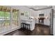 Charming kitchen with stainless steel appliances, breakfast bar, and hardwood floors at 238 Ivy Glen Cir, Avondale Estates, GA 30002