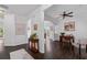 Open living room features dark hardwood floors, white walls and an archway at 238 Ivy Glen Cir, Avondale Estates, GA 30002