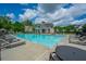 Relaxing community pool with lounge chairs and seating areas, perfect for enjoying sunny days at 3755 Valleyway Rd, Cumming, GA 30040