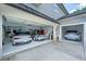 Spacious three-car garage featuring epoxy floors and ample storage for vehicles and tools at 3755 Valleyway Rd, Cumming, GA 30040