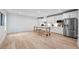 Bright kitchen featuring an island, stainless steel appliances, and plenty of natural light at 3755 Valleyway Rd, Cumming, GA 30040