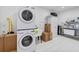 Bright laundry room featuring modern appliances and ample storage for organization at 3755 Valleyway Rd, Cumming, GA 30040