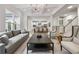 Open-concept living area with hardwood floors, recessed lighting, and seamless flow to dining at 3755 Valleyway Rd, Cumming, GA 30040
