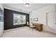 Bright office space with large window and modern design is perfect for remote work at 3755 Valleyway Rd, Cumming, GA 30040