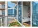 Relaxing outdoor space on balcony, furnished with a table, offers city views at 400 W Peachtree Nw St # 2614, Atlanta, GA 30308