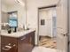 Bathroom features granite countertop, modern lighting, and sleek fixtures at 400 W Peachtree Nw St # 2614, Atlanta, GA 30308