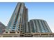 Exterior view of high-rise building showcasing modern architecture, featuring multiple floors of condominium units at 400 W Peachtree Nw St # 2614, Atlanta, GA 30308
