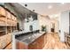Open concept kitchen features a breakfast bar, storage and stainless steel appliances at 400 W Peachtree Nw St # 2614, Atlanta, GA 30308